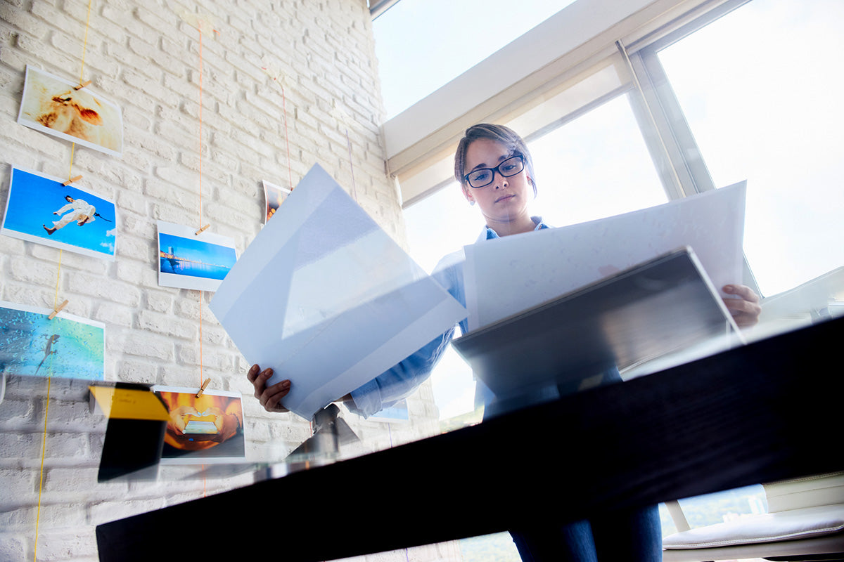 Woman making photocopies at the office