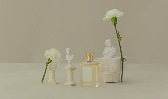 perfume bottle and flowers