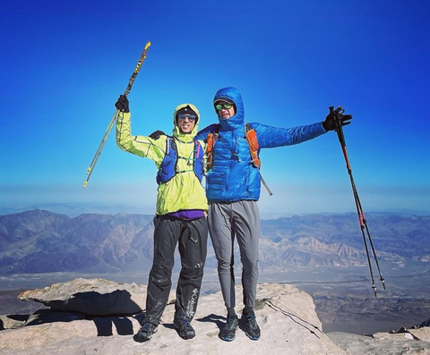 Two men and Trail Butter professional runners summit Mt. Whitney
