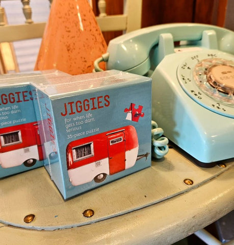 Mini jigsaw puzzle with vintage travel trailer theme
