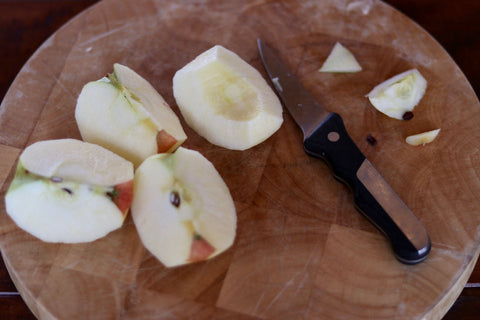 Cored apple quarter  with a paring knife