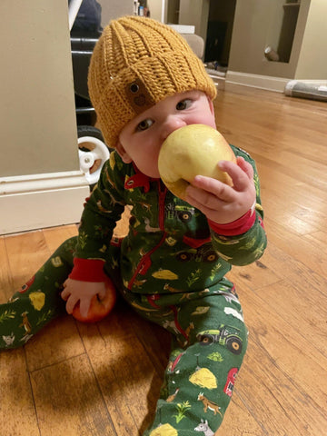 Organic apple for teething baby