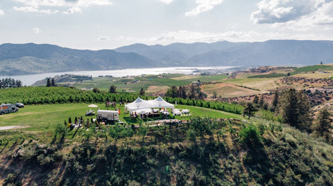 The Venue at Chelan Ranch drone picture of tent and lake