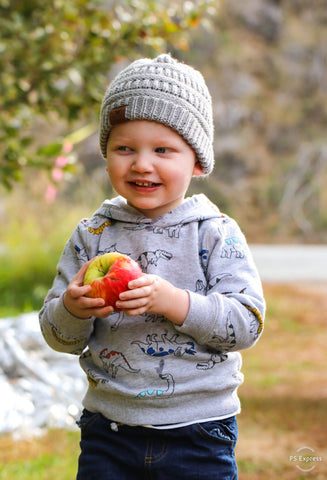 Organic fruit in an apple orchard for toddler