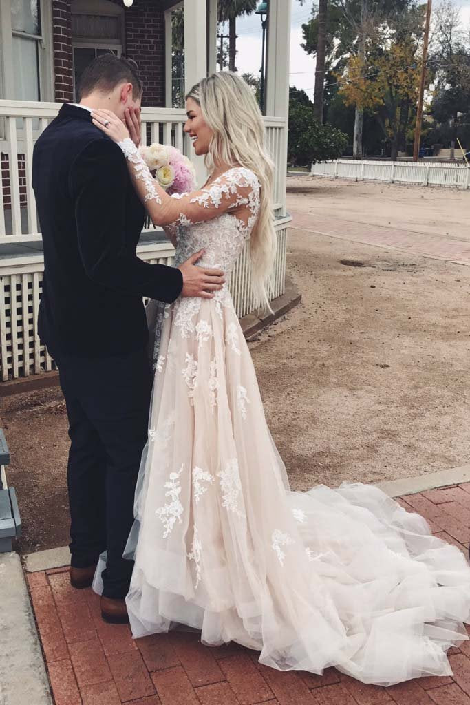 long sleeve lace and tulle wedding dress