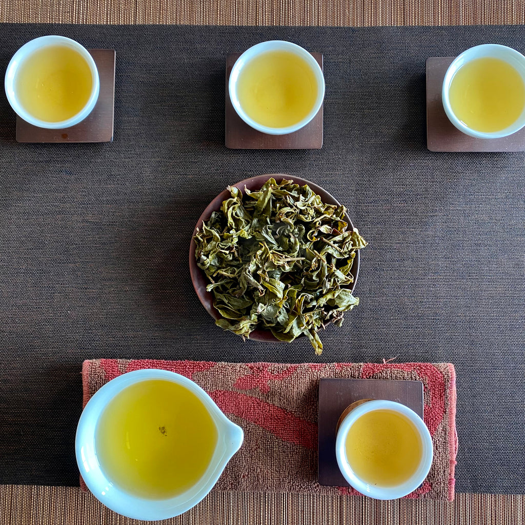 Dong Pian Oolong brewed tea in a cup