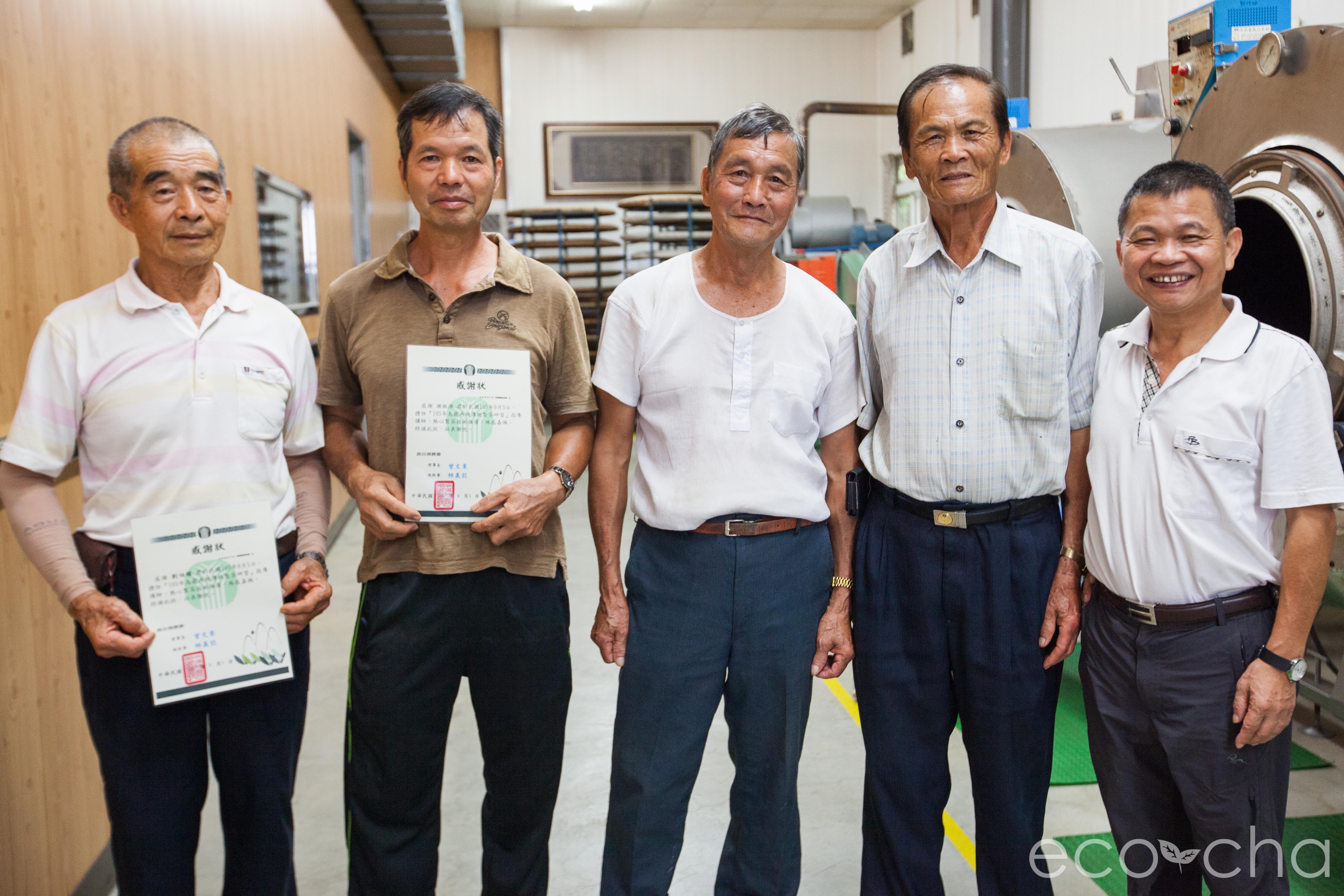 Artisan oolong tea masters pose for a picture for Eco-Cha.