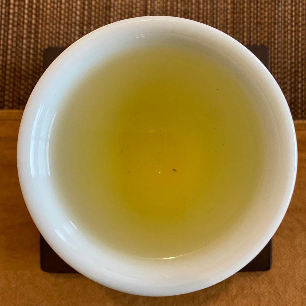 Li Shan High Mountain Oolong brewed tea in a cup