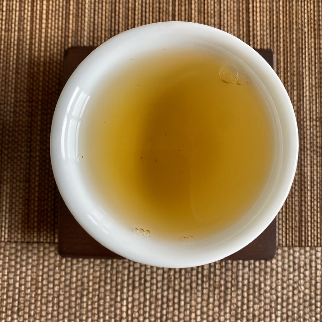 High Mountain Concubine Oolong brewed tea in a cup