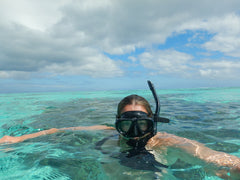 hawaiian lady snorkeling in moorea