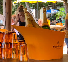 yellow bucket of veuve clicquot champagne