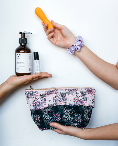 Self-care gift set at The WYLD shop: perfume, body lotion, pouch, scrunchie and adult toy