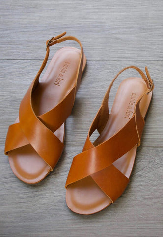 Crossover tan leather sandals by Annie & Lori available at The WYLD Shop
