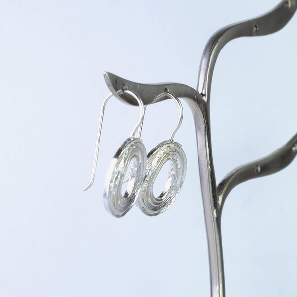 Textured Silver Round Drop Earrings by JB Designs.