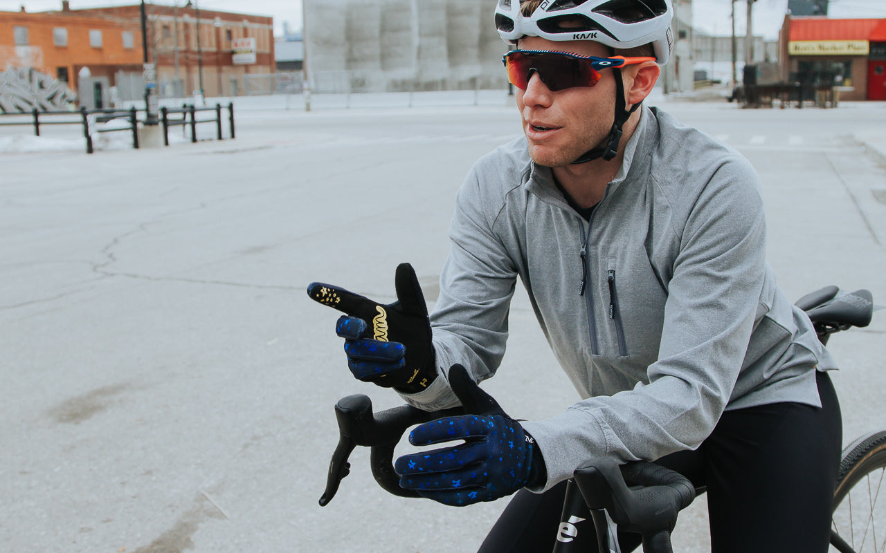 MuskOx Outdoor Apparel, Image of Cyclist Wearing a Grey Quick Drying Quarter Zip