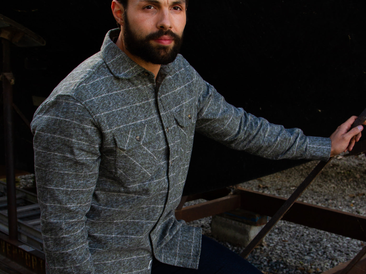 Photo of Man Outside Wearing Moss Green MuskOx Flannel Shirt