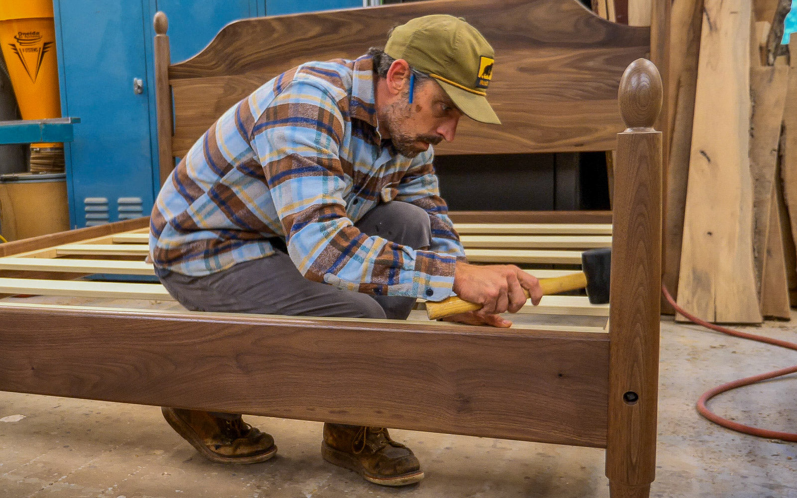 Andy Rawls Fine Tuning a Wood Bed Frame