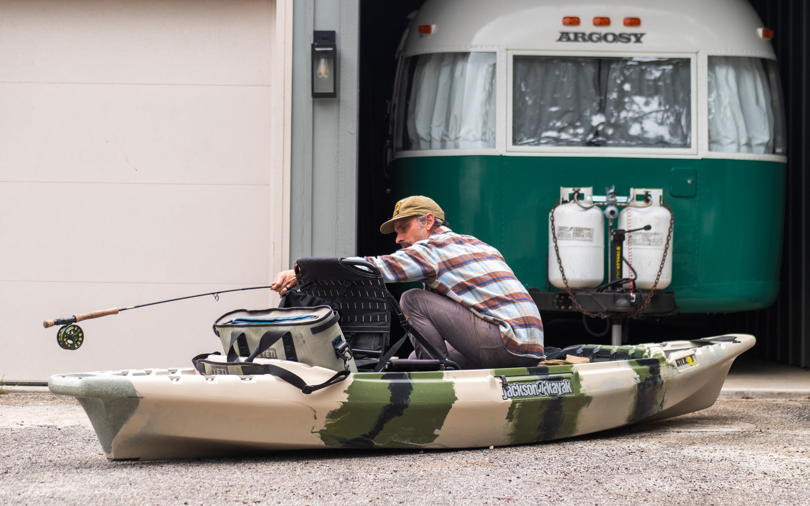 Andy Rawls Working on His Kayak Setup