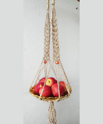 Beige handcrafted jute and wooden treads macrame fruit or plant holder