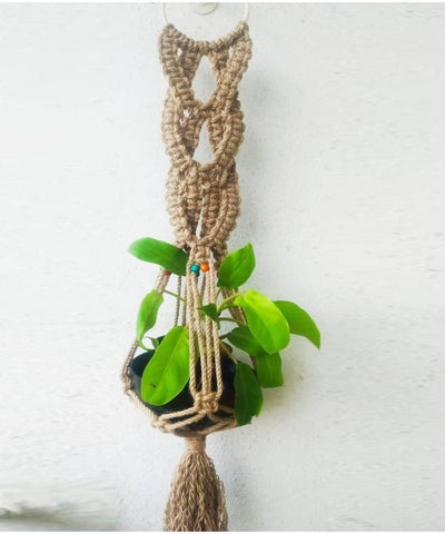 Brown handcrafted wooden beads jute macrame planter