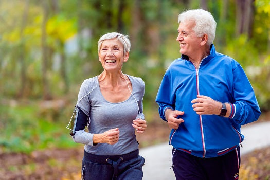 Image of an elderly couple jogging.