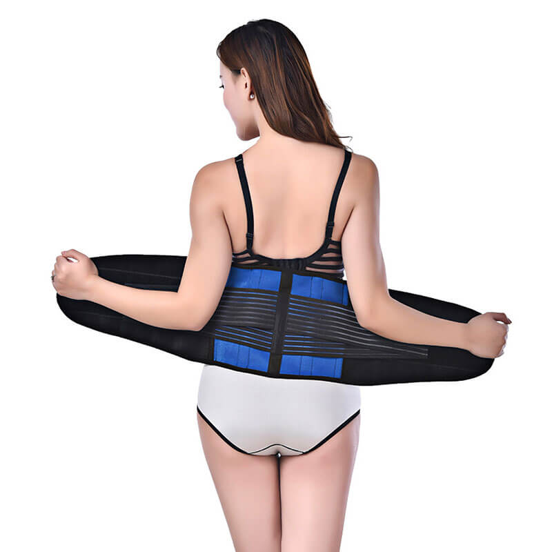 Image of a woman wearing the LumbarExtreme back brace from the rear view.