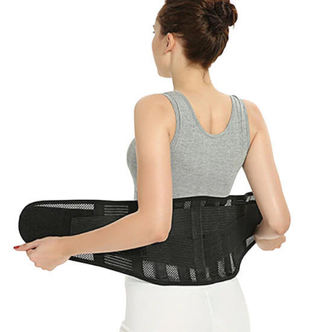 Woman wearing LumbarLite back brace.