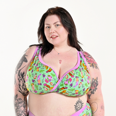 Molly is wearing a green and pink Secret Garden bra