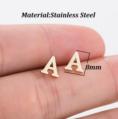 Here's a question; how do you spell 'Cute'? With four pairs of these cheerful Alphabet Stud Earrings, that's how!  Well.. maybe that and a trip to the local Body Piercing expert! No matter how many Spelling-Bee's you have won (or haven't entered), it's easy to sound-out the savings when you check out our sale-price.  Keeping up a fresh look can be an expensive way of life after all!   We use surgical stainless steel as the base metal in these simple, classic studs - perfect for wearing in the summer months or in hotter climates - and then painstakingly plate them in your desired finish (Gold, Silver or Cobalt) to make sure the end result is smooth and detailed (even in those teeny little corners!), before shipping them out to you. That's why we don't just think you'll love them. We know you'll love them! Just like all the amazing custom-personalized or artisan hand-crafted treasures in the CustomizedBling.net Catalog, these C-U-T-E Statement Studs are protected by our easy 30 day return policy; and feature complete package tracking from origin to destination at No Charge under our standard shipping rates!        Base Metal: Stainless Steel construction (benefits include: Sturdy and long lasting jewelry, jewelry can be worn in hot and cold climates and the hot summer sun without absorbing heat). Earring Size: Approximately 8 millimeters.