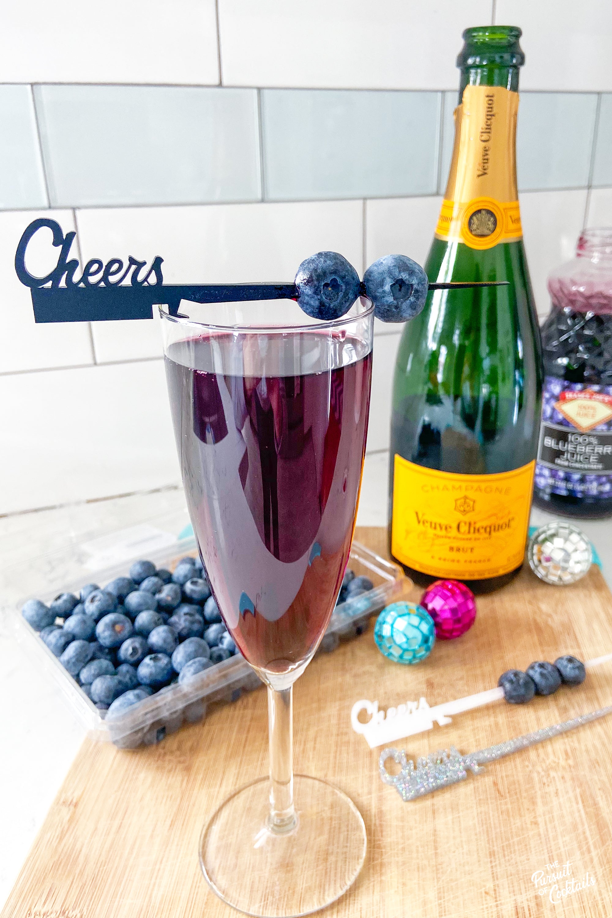 Champagne cocktail using blueberry juice from Trader Joes