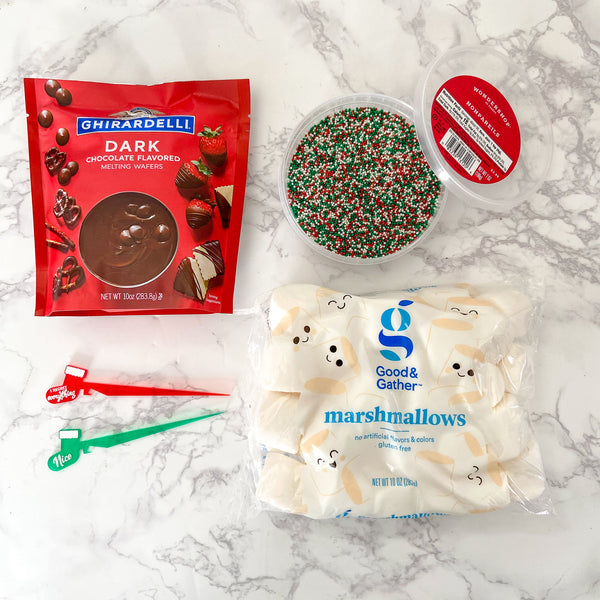 Chocolate dipped marshmallow drink garnish using a holiday Swizzly