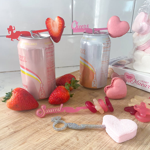 Girls' night drinks idea love-themed cocktail garnishes for canned cocktails using Swizzly Sticks