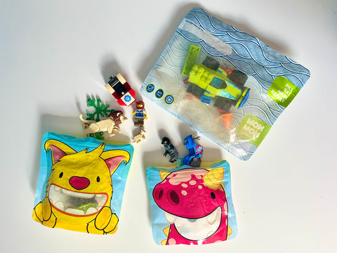 old snack and sandwich bags filled with toys and lego