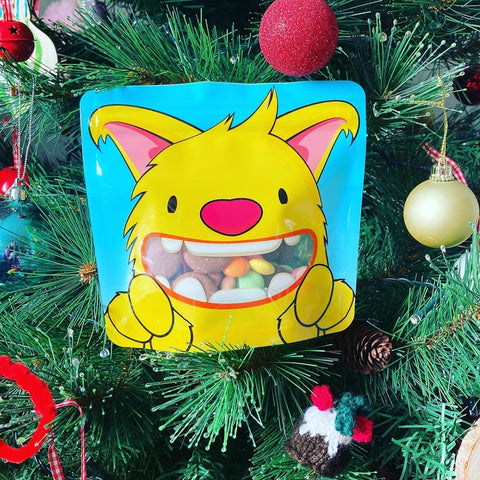 Reusable snack bag filled with sweets in a tree