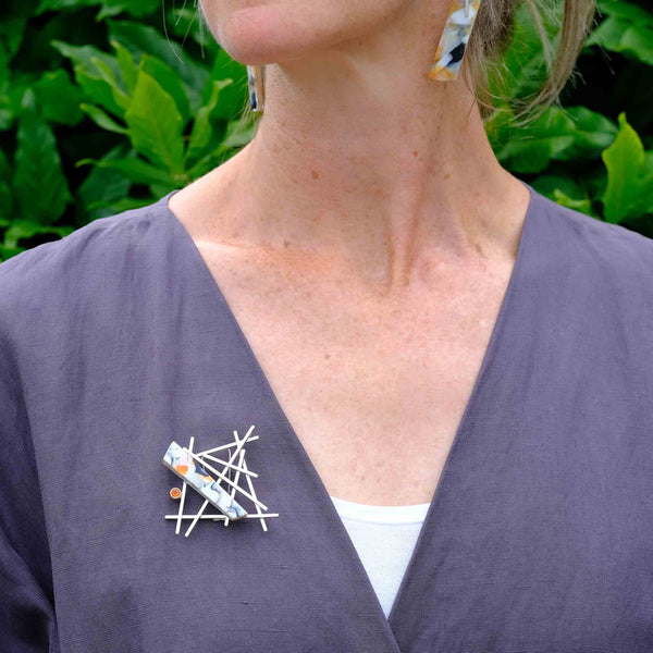 Jeweller Deborah Beck wearing her Plasticity Legacy Brooch