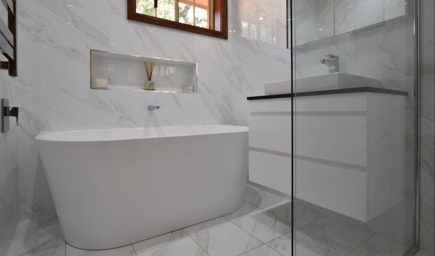 Deanne's bathroom features a back to wall bath tub, much easier to clean as there are less gaps
