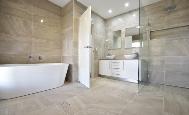 Bathrooms with large tiles are easier to clean due to less grout, especially in the shower!