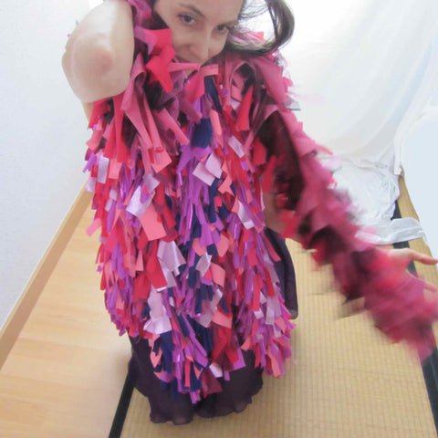 Alex Mitchell feeling happy posing with her favorite soft multicolor lush fashion boa scarves from Twinki-Winki.