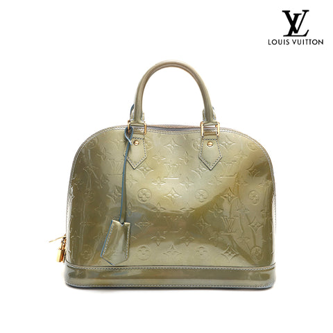 Louis Vuitton LOUIS VUITTON Blotton XL Medalion PG AU750 Malachite Dia –  NUIR VINTAGE