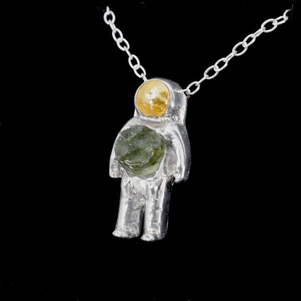 Astronaut-necklace-with-moldavite-glass-sterling-silver-astronaut-pendant-space-jewelry-necklace-2.jpg__PID:cf6d8e0d-b711-4559-844a-df619e637812