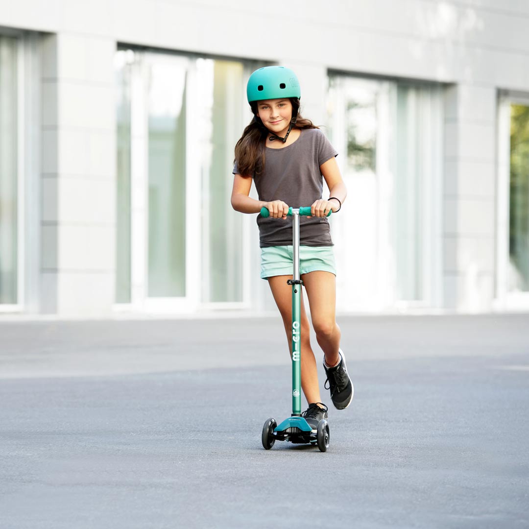 10 year old scooting on kids eco 3 wheel scooter