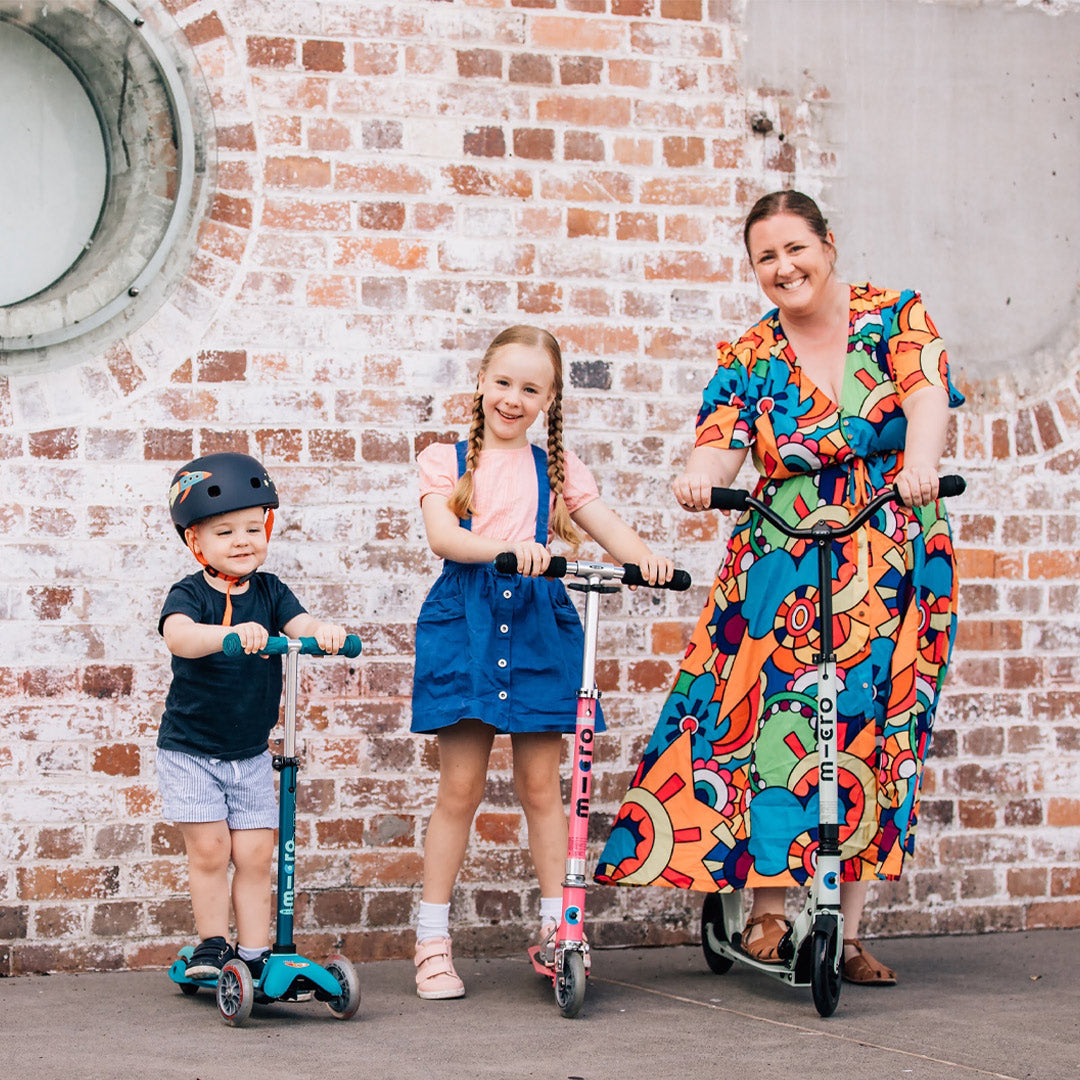 Mum scooting with her children