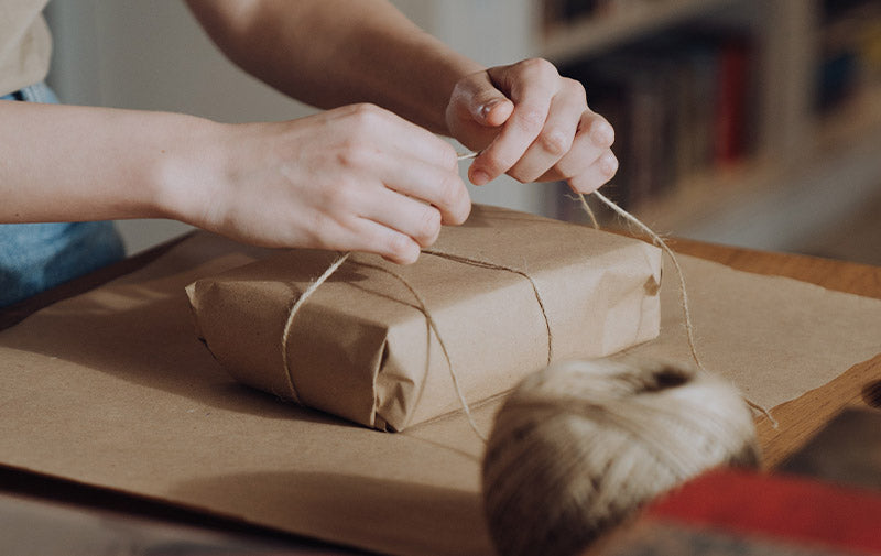 xmas present in brown paper wrapping