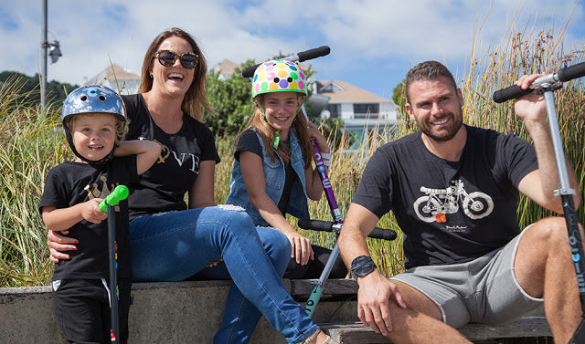 Family together on their Micro Scooters