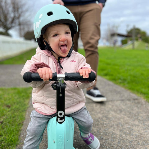 micro ambassador jess with her daughter on a ride on 3 wheel scooter