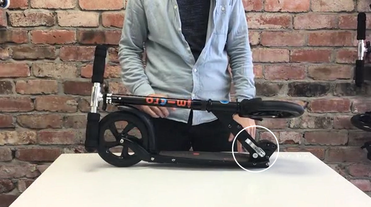 How to fold and unfold a Micro Classic Adult Scooter - Step 1