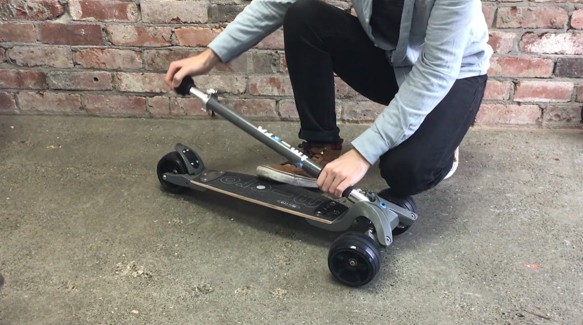 How to fold and unfold a Micro Kickboard Scooter - Step 1