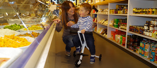 Mum and child out with the Micro Trike