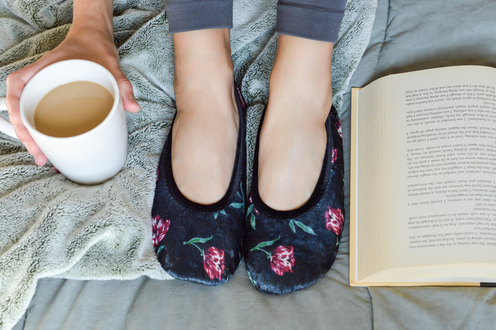 Velour Victoria Ballerina Slippers on model reading a book with coffee in her hand