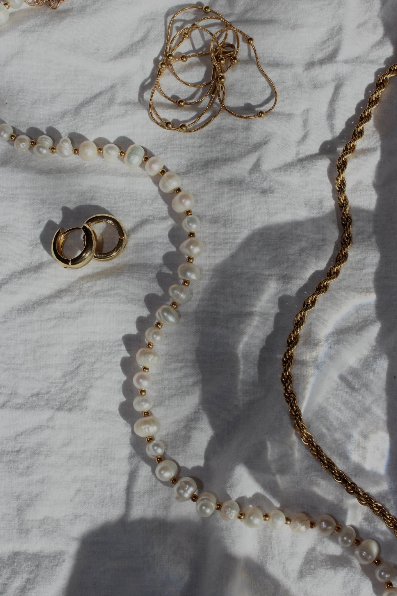 gold plated stainless steel and pearls jewelry from salty threads